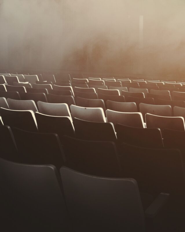 A photo of vacant seats in a theater